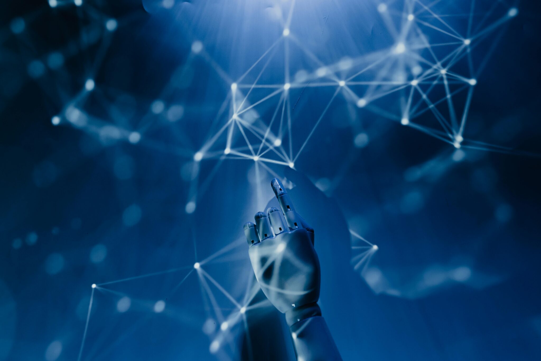 Machine hand touching a data network